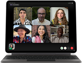 iPad Air, attached to Magic Keyboard, Black color, Group FaceTime call on screen